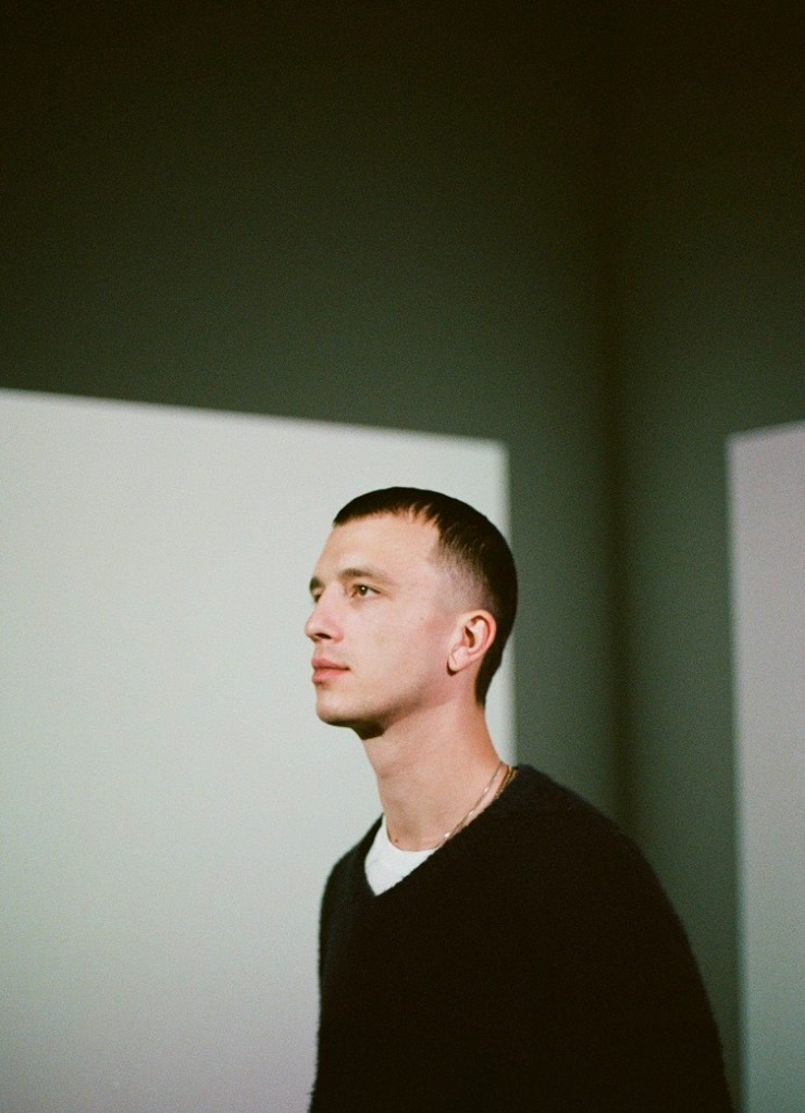 Lucas Brunner, co-founder of Alpgency, in profile against a minimalist interior.